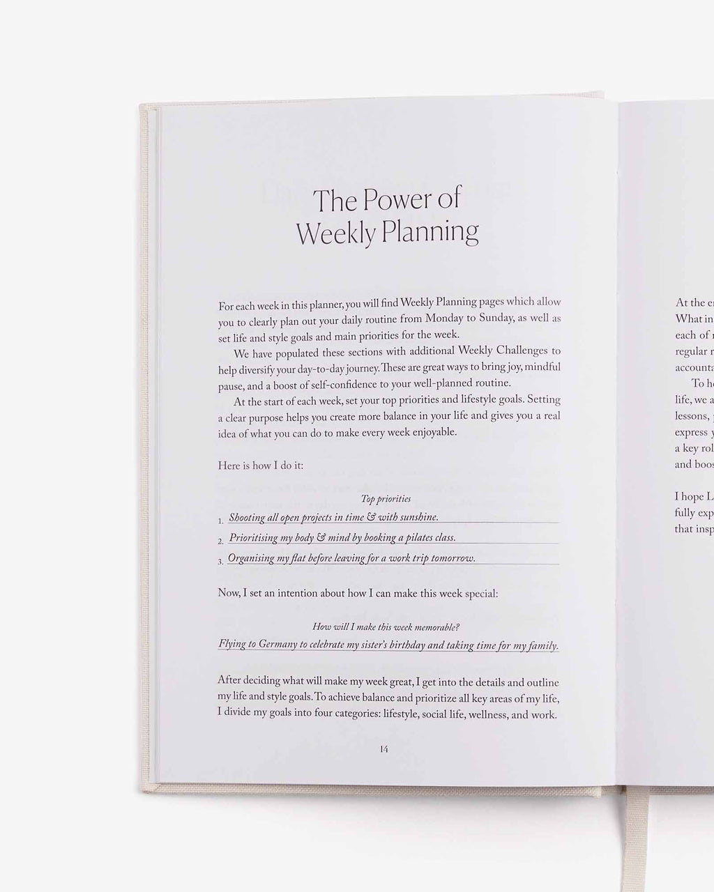 Open book showing text on weekly planning and goal setting.