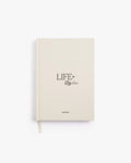 Beige planner with 'LIFE' and 'Style' text on a white background