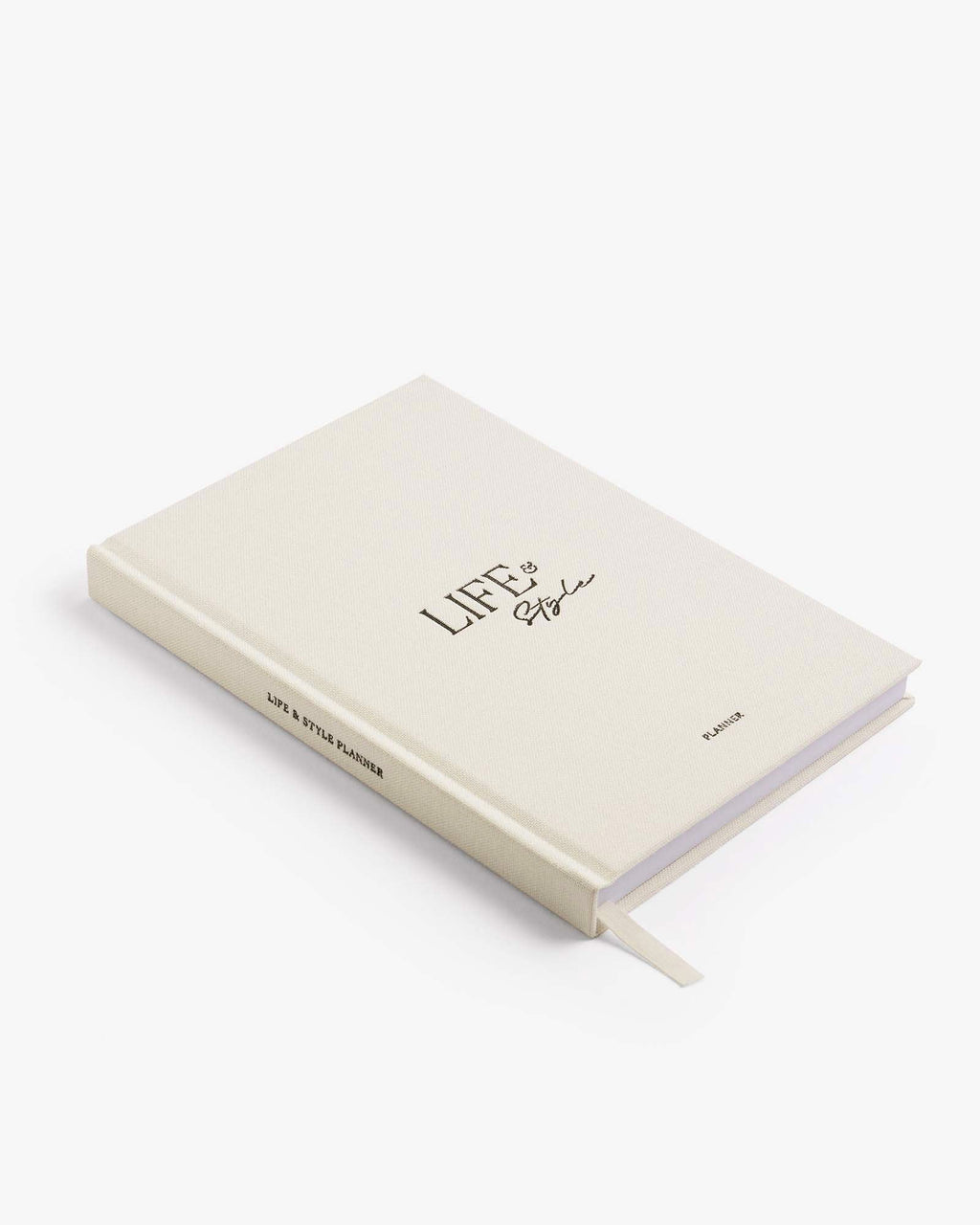 Beige notebook with 'Life is Good' text on a white background