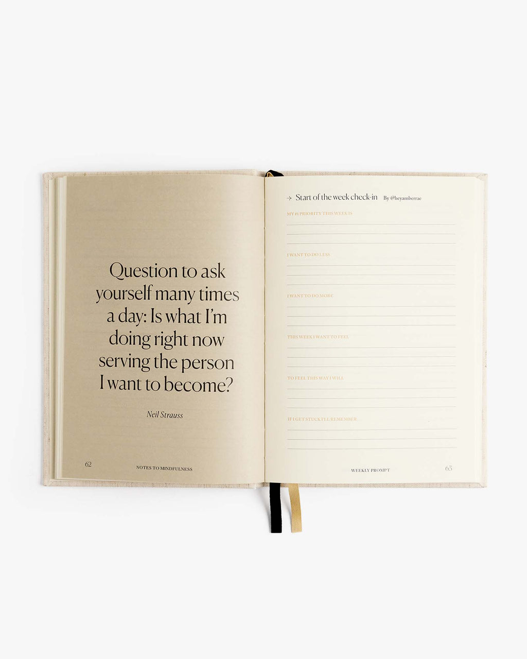 Open book with a quote by Neil Strauss on a white background