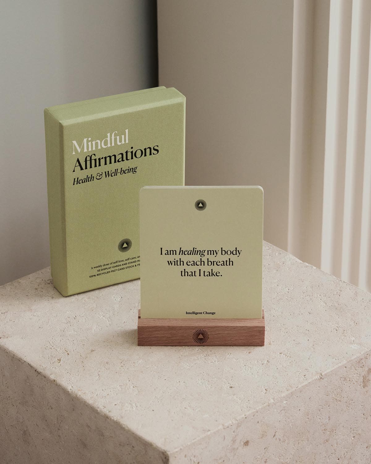 Two green books titled 'Mindful Affirmations' on a light surface.