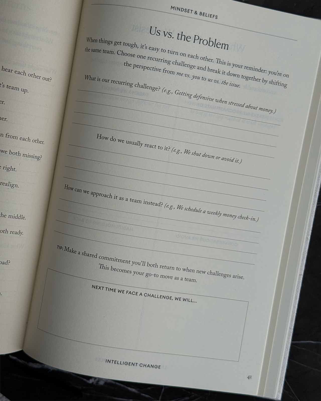Open book with text on a black background