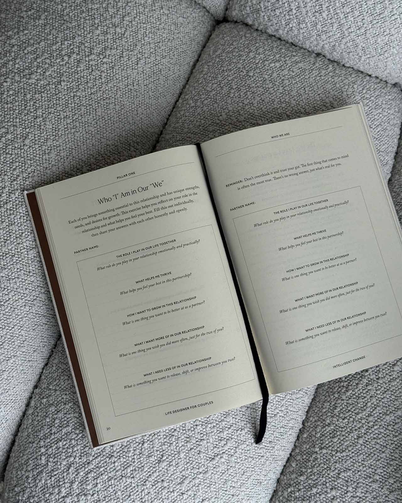 Open book with text on a textured surface