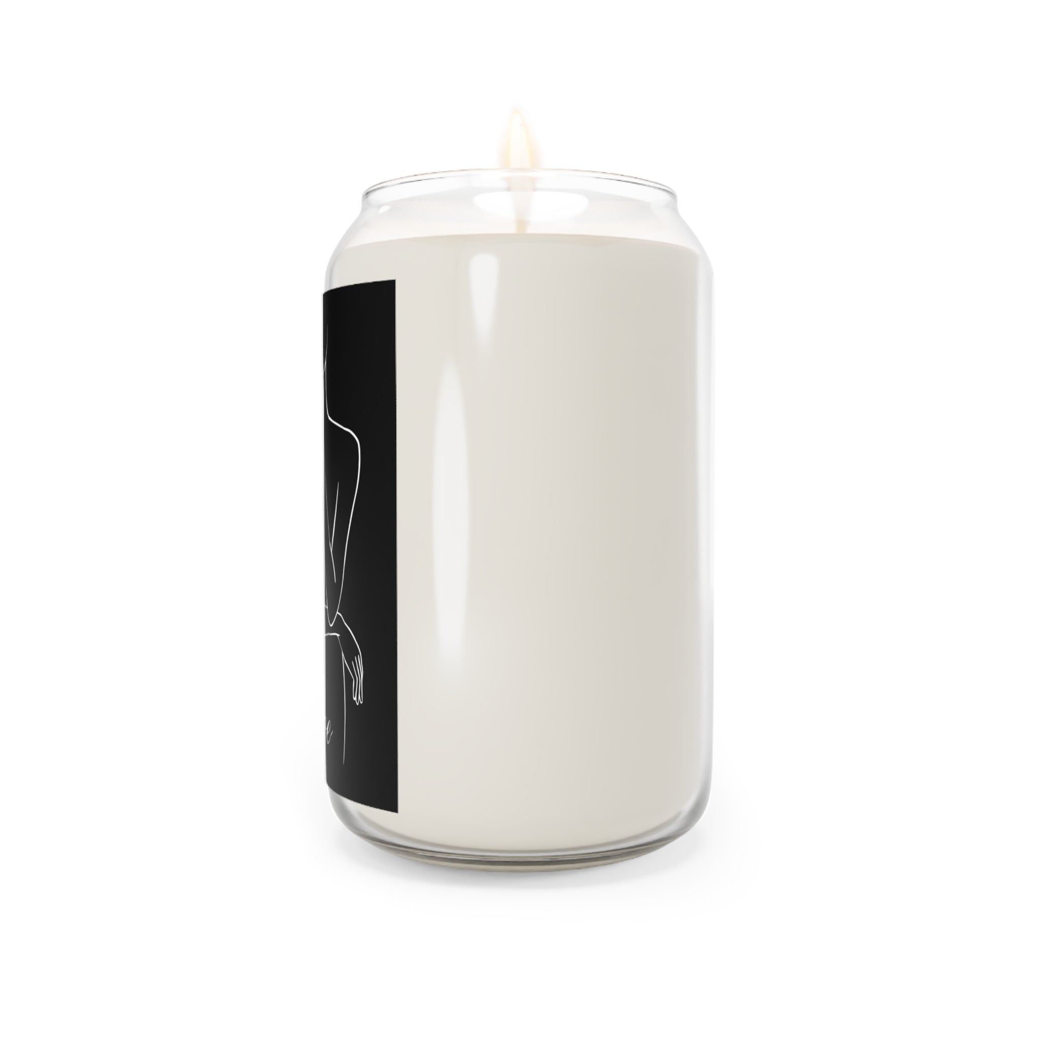 White candle with a black label featuring a white silhouette on a white background
