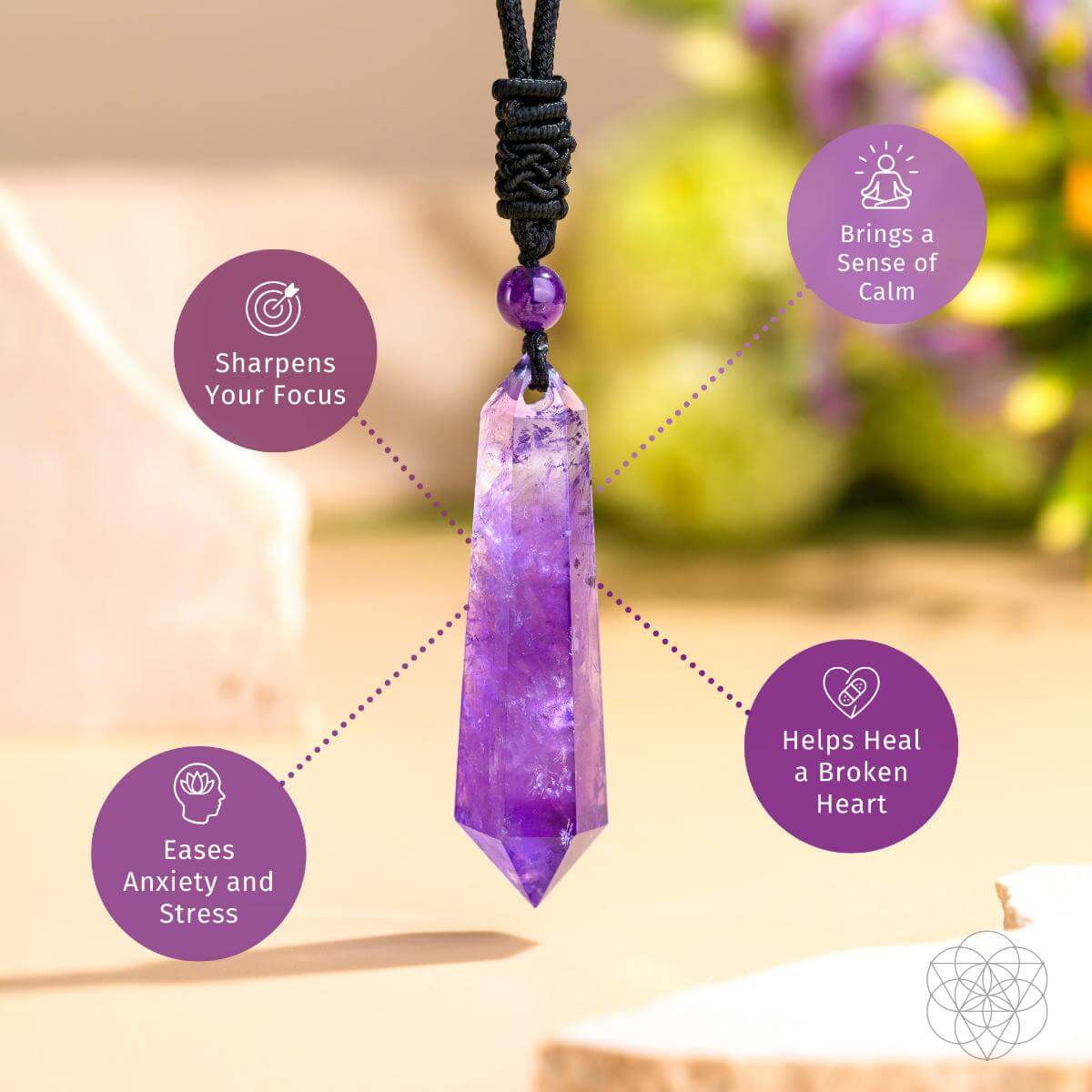 Purple crystal pendant with wellness benefits text on a blurred natural background