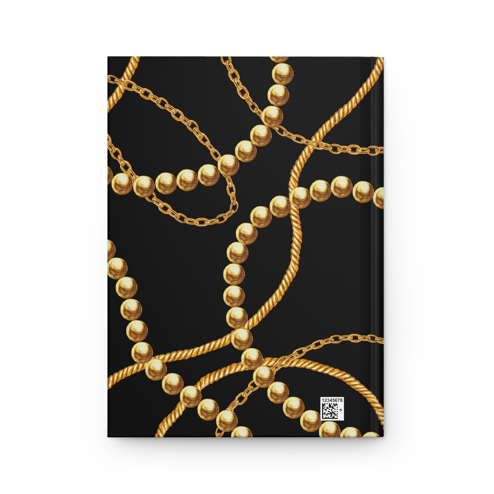 A hardcover notebook with a black cover decorated with a repeating pattern of gold chains and pearl-like beads, shown against a plain white background.