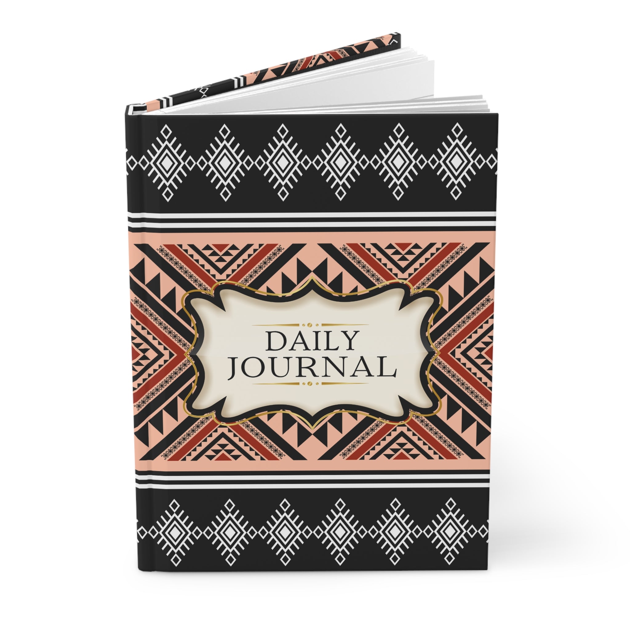 Black notebook with floral design and 'There Will Be Miracles' text on a white background