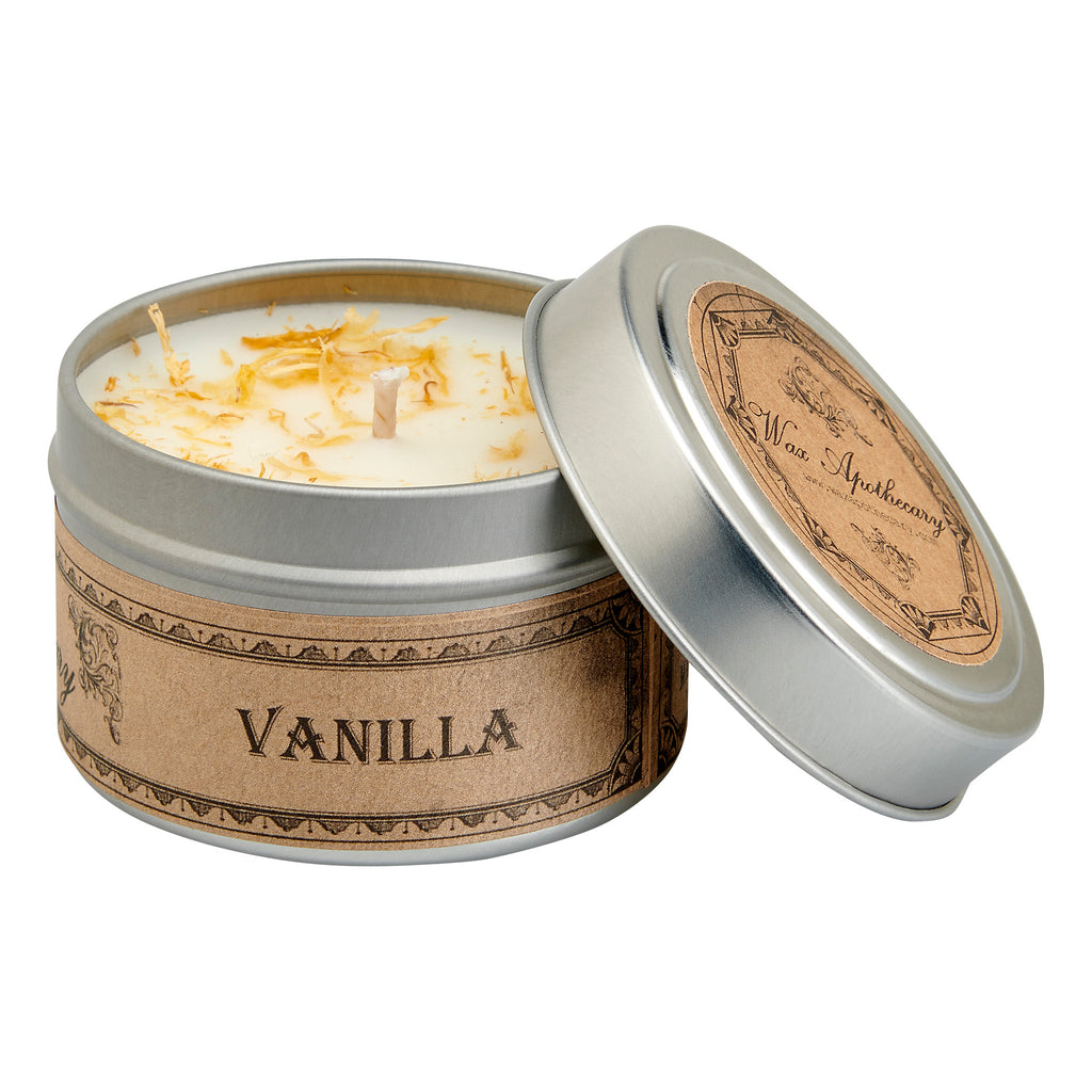 Vanilla scented candle in a tin with decorative label on a white background