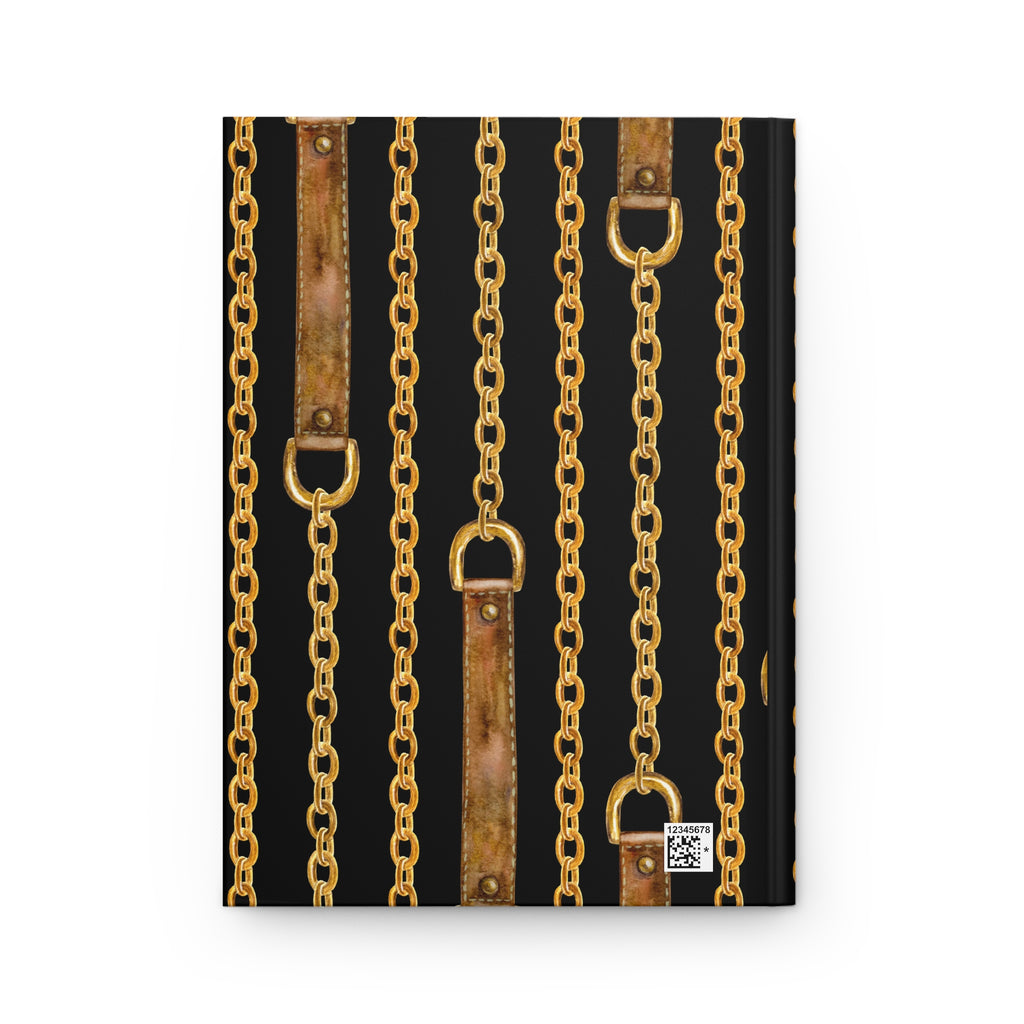 A hardcover notebook or journal featuring a repeating pattern of vertical gold chains and distressed brown leather straps on a black cover, shown against a plain white background.