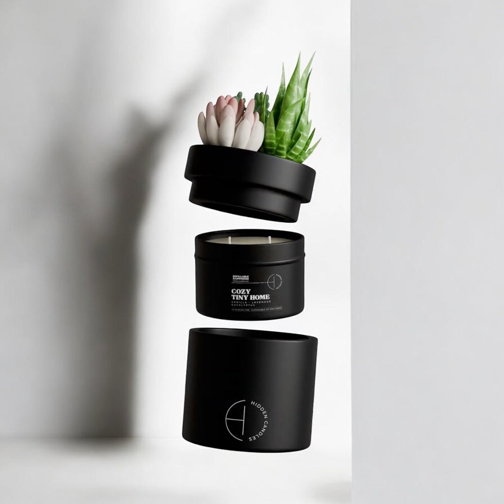Black candle with plant design on a white background