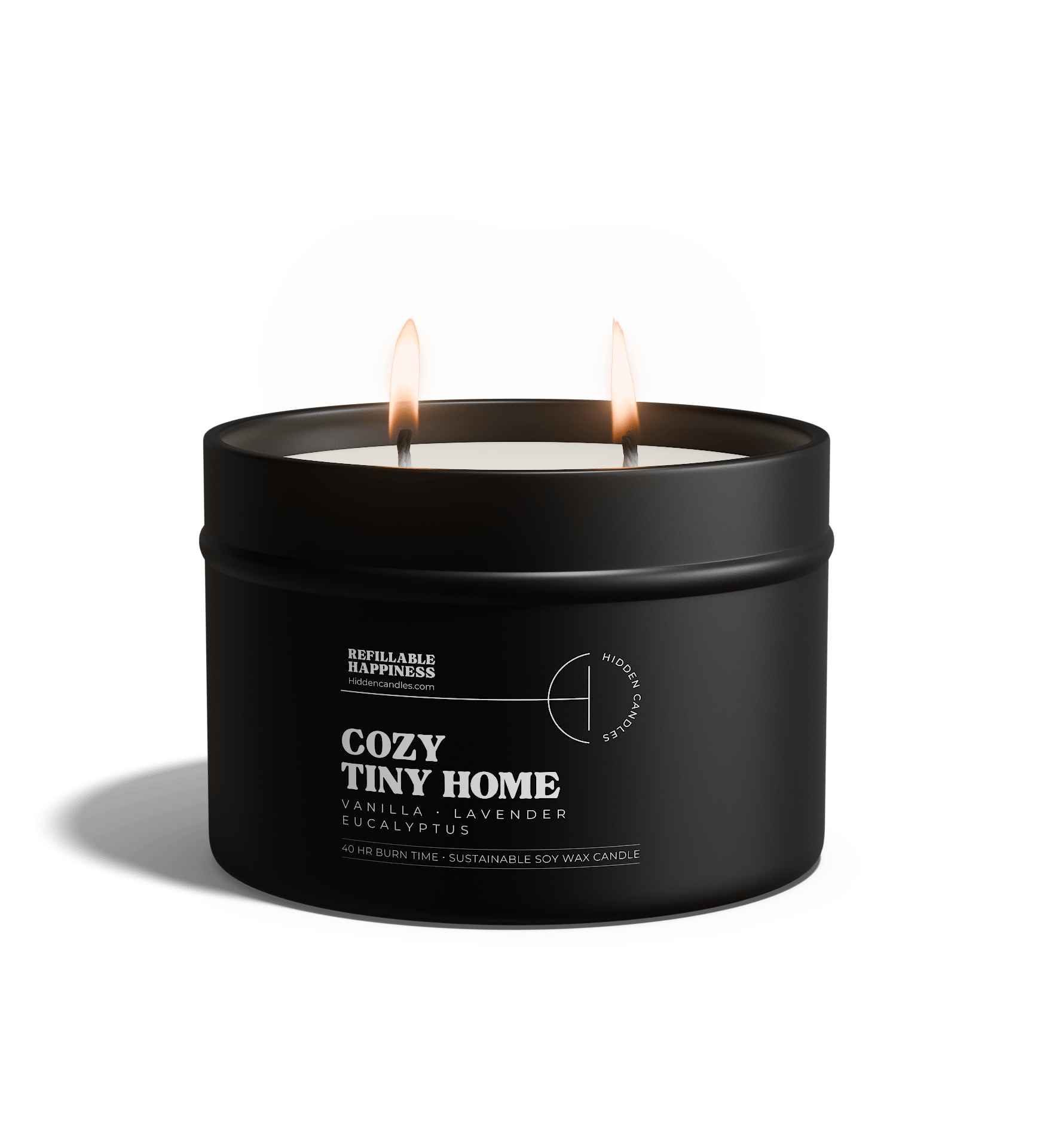 Black candle in a tin labeled 'Cozy Tiny Home' with a white cloud-like object in the background.