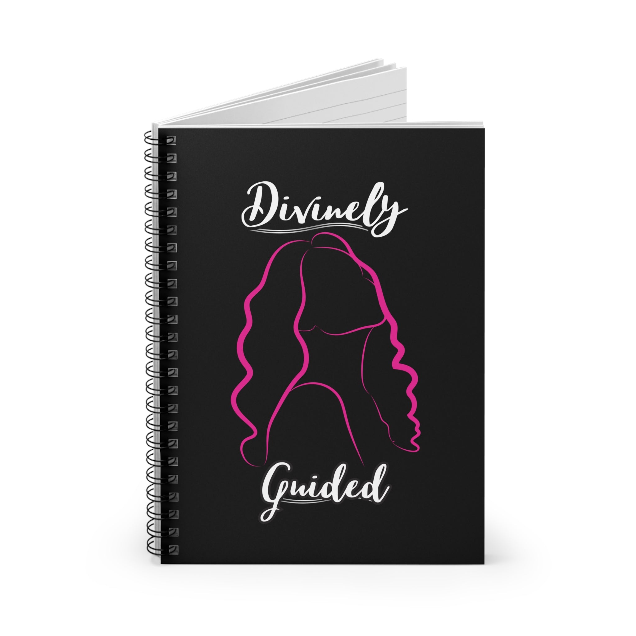 Black notebook with a pink silhouette of a woman's head and the text 'Divinely Guided' on a white background