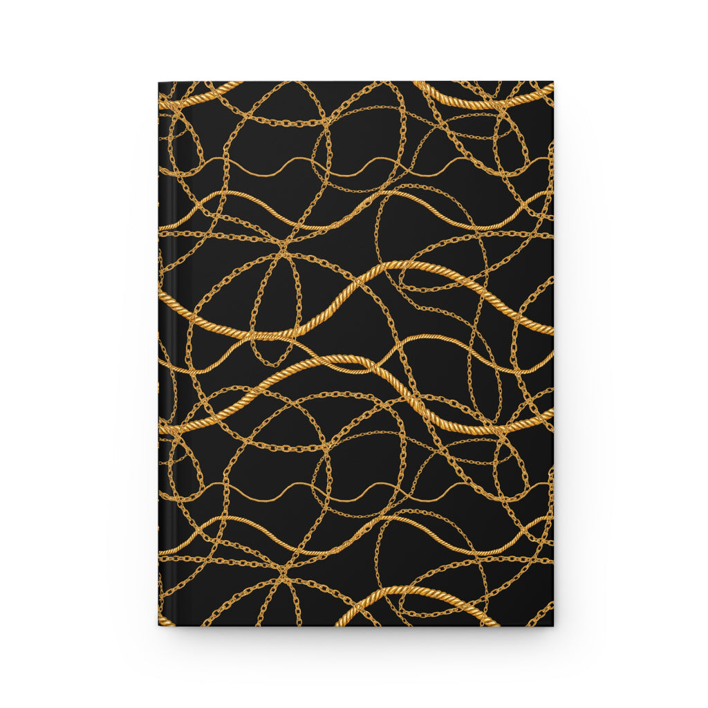 A hardcover notebook or journal with a black cover decorated with a repeating pattern of intertwined gold chains, shown against a plain white background.