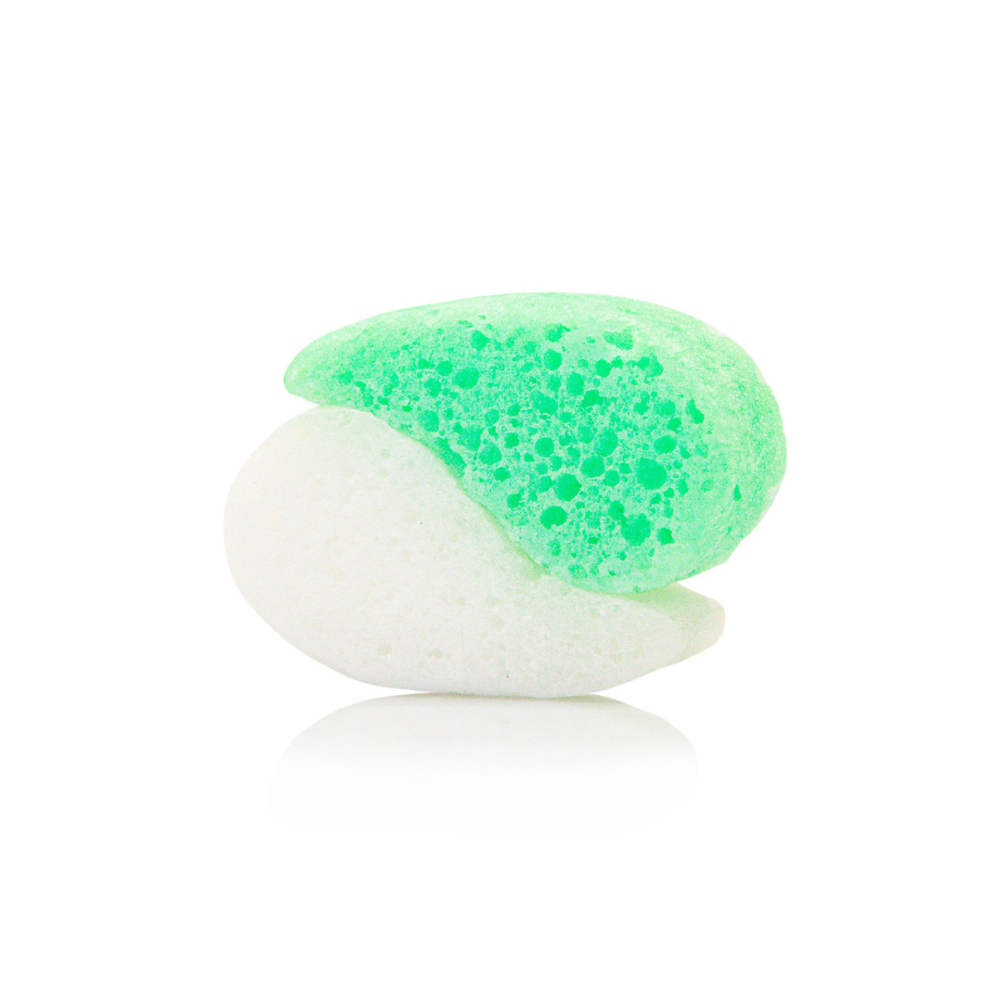Green and white sponge on a white background