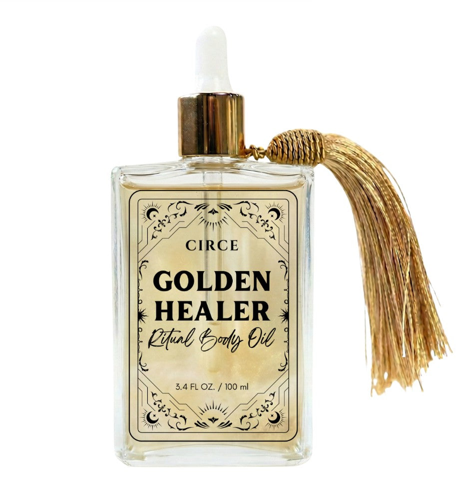 Circe Golden Healer Ritual Body Oil bottle with tassel on a white background