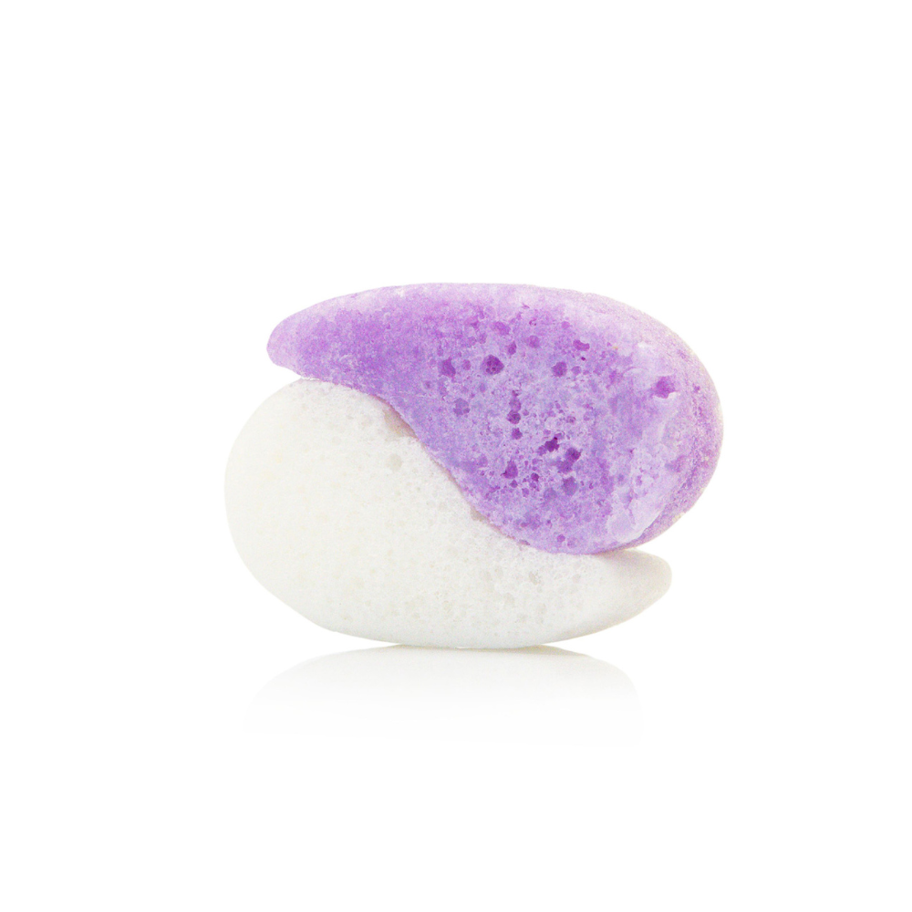 Purple and white bath bomb on a white background