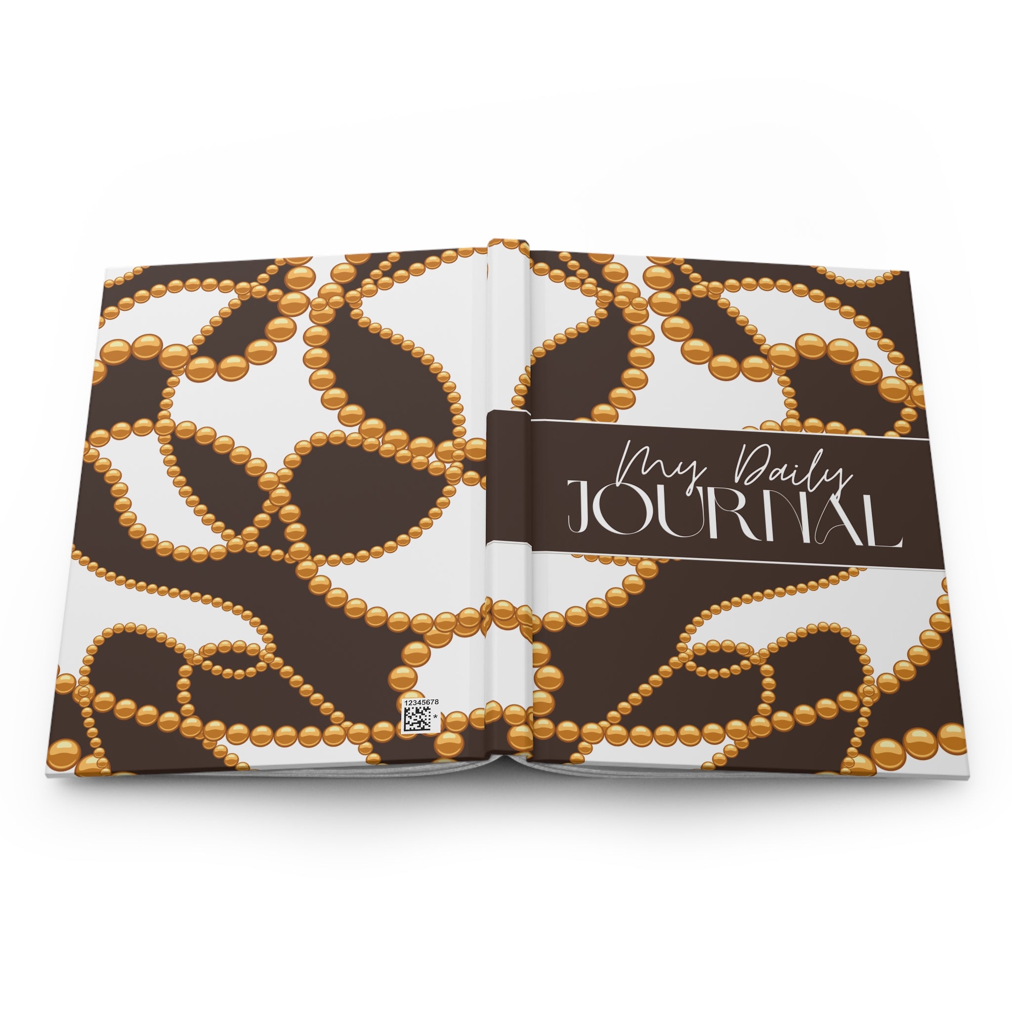 An open hardcover daily journal with a brown and white cover pattern featuring gold beaded loops, and a dark brown title band reading 'Mrs. Daily JOURNAL'.