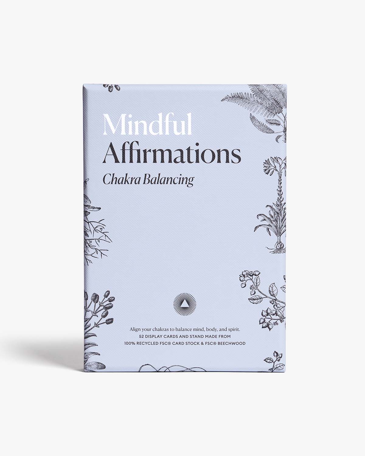 Packaging of 'Mindful Affirmations Chakra Balancing' product with floral designs on a white background
