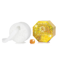 White silicone sponge and yellow packaging with brand logo on a white background