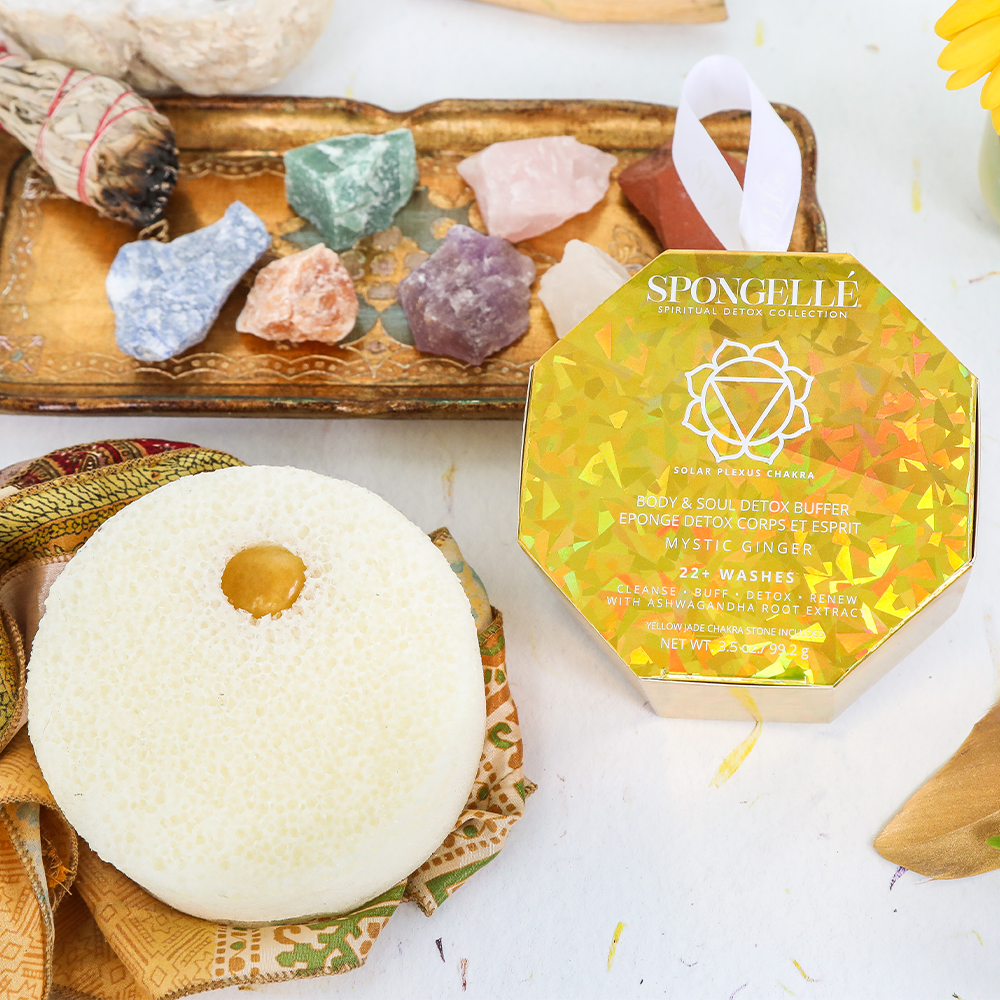 Spongellé product with bath bomb and crystals on a white background