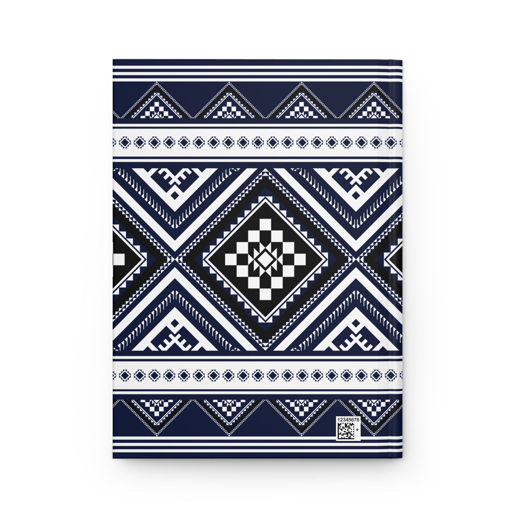A notebook with a navy blue, white, and black geometric tribal pattern cover, shown flat against a white background.