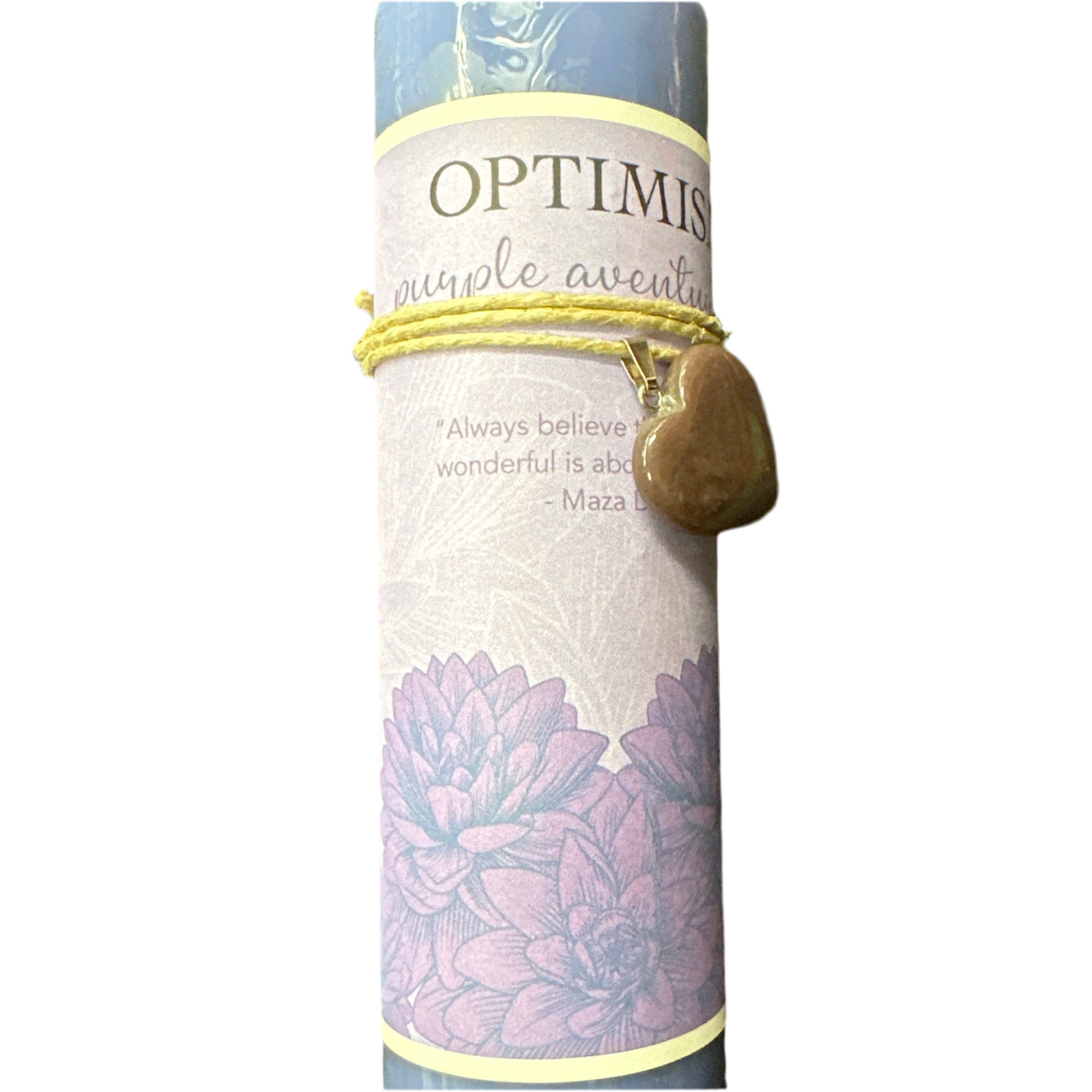 A rolled-up 'Optimism Purple Adventure' yoga strap with a yellow cord and a polished brown heart-shaped stone charm, shown against a plain white background.