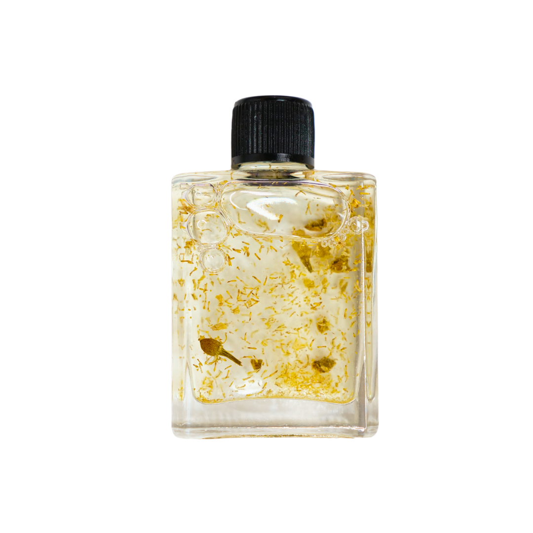 Clear bottle with black cap containing a yellowish liquid on a white background