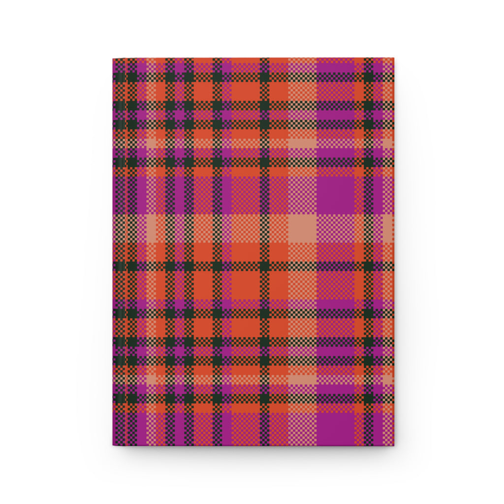 A notebook with a vibrant plaid cover pattern featuring magenta, orange, purple, and black stripes, shown against a plain white background.