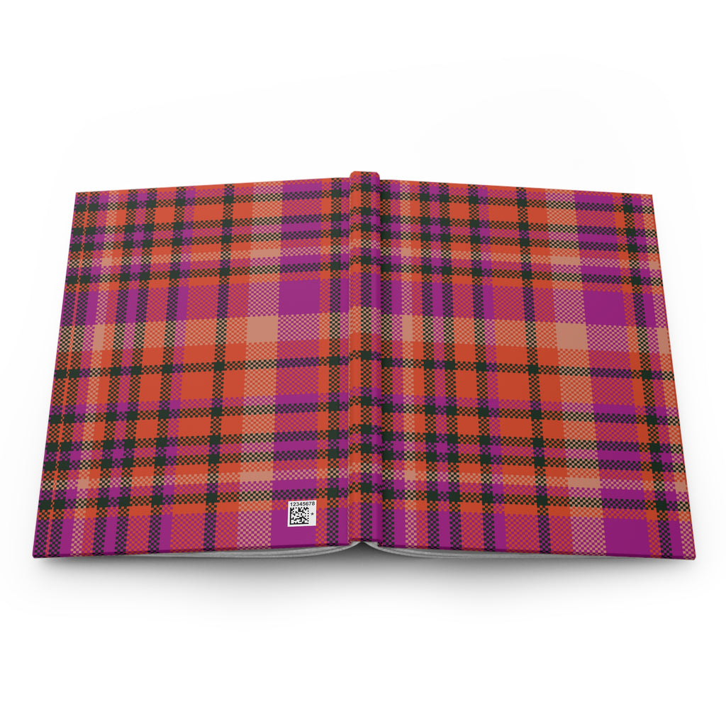 An open hardcover book displaying a vibrant magenta and orange plaid pattern on both covers, set against a clean white background.
