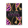 A hardcover daily journal with a black cover featuring pink zebra stripes, gold rope patterns, and gold tassels, with the text 'My Daily JOURNAL' printed across the center.
