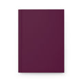 A hardcover notebook with a solid deep plum purple cover, shown from a front-facing perspective on a clean white background.