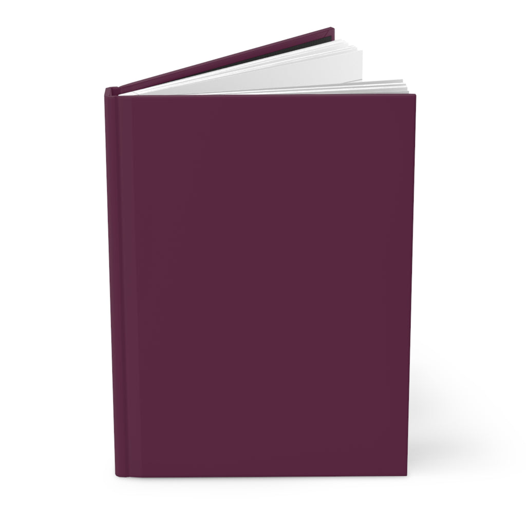 A hardcover book with a solid dark plum purple cover, shown standing upright and slightly open to reveal white pages, on a clean white background.