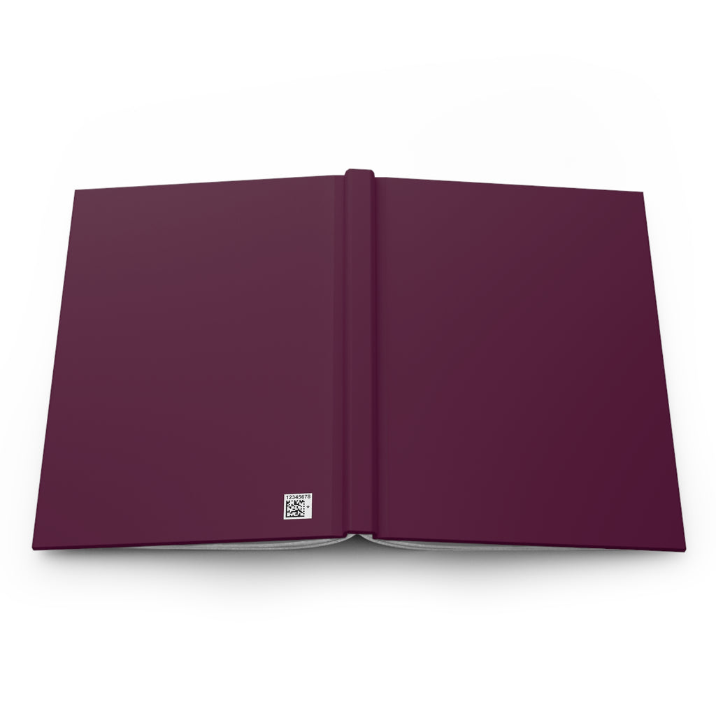 A hardcover notebook or journal shown open flat against a clean white background. The cover is a deep plum or burgundy purple with a small square logo near the lower left corner.
