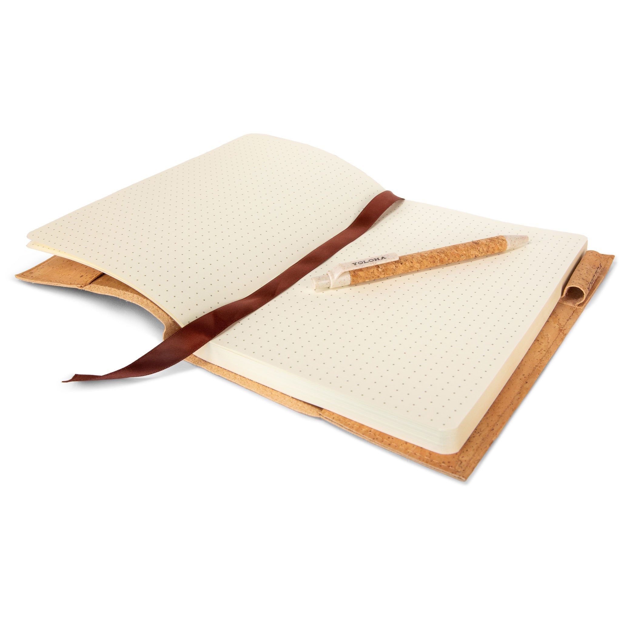 Open notebook with a pen on a white background
