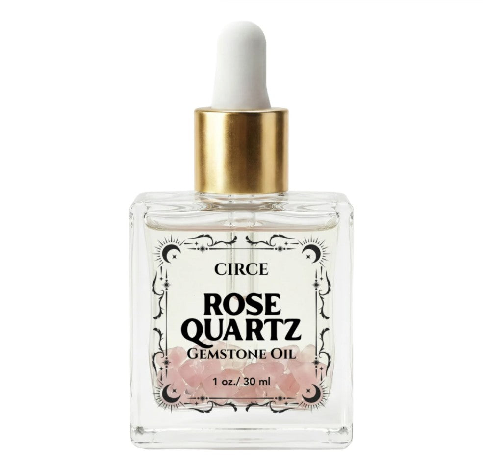 Circe Rose Quartz Gemstone Oil bottle on a white background