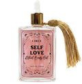 Circe Self Love ritual body oil bottle with gold tassel on a white background