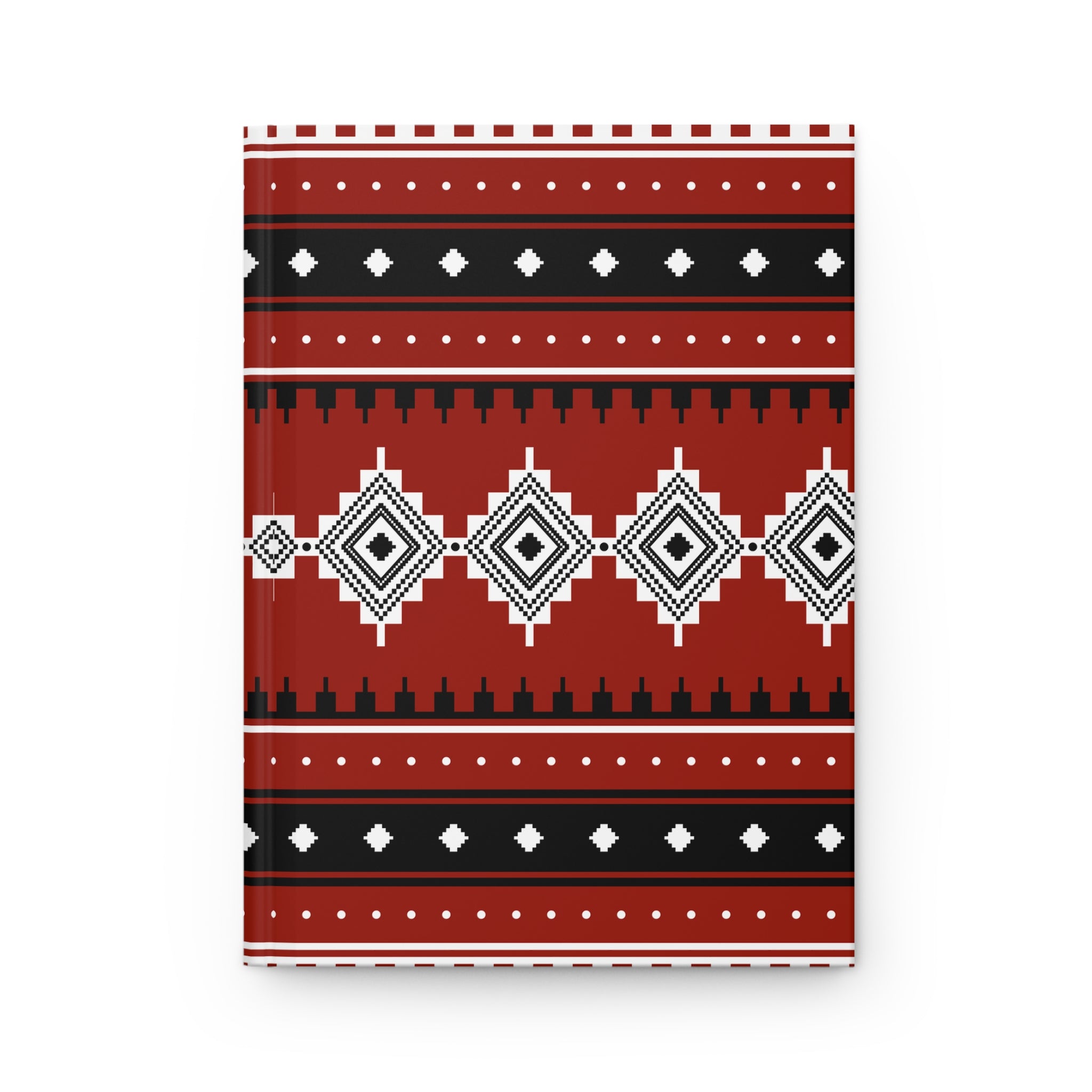 A hardcover notebook with a geometric Southwestern-style pattern in red, black, and white, shown on a clean white background.