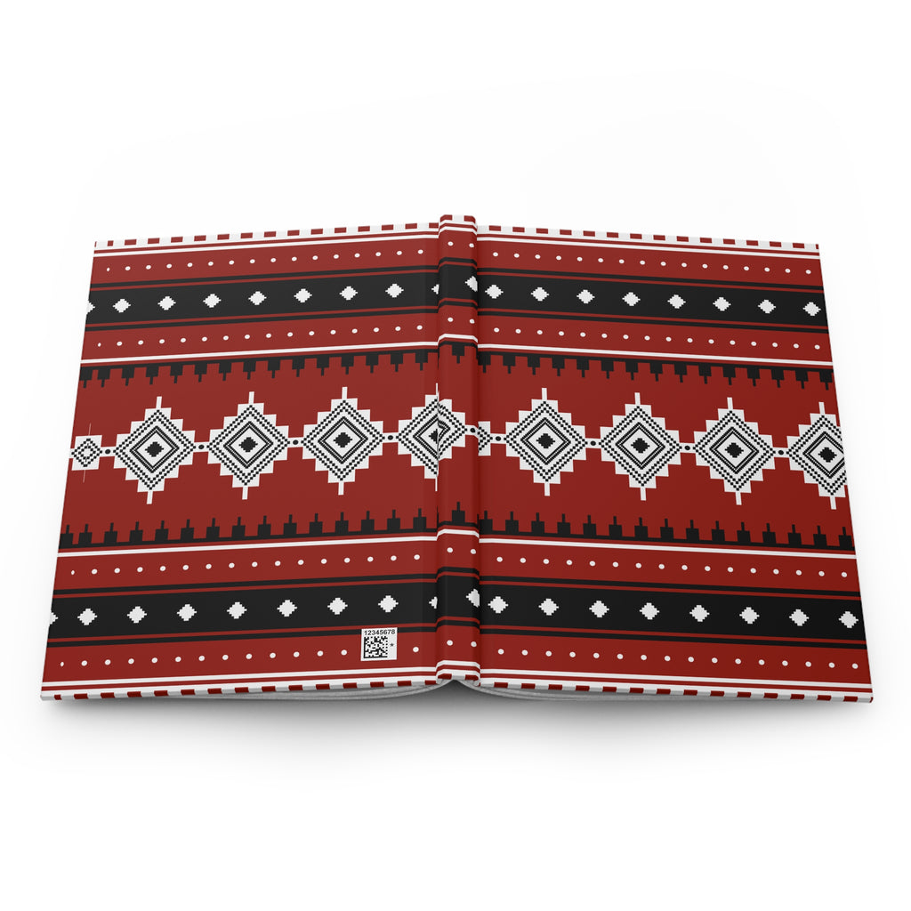A folded fabric item, likely a blanket or throw, featuring a bold geometric tribal pattern in red, black, white, and gray, displayed flat against a clean white background.