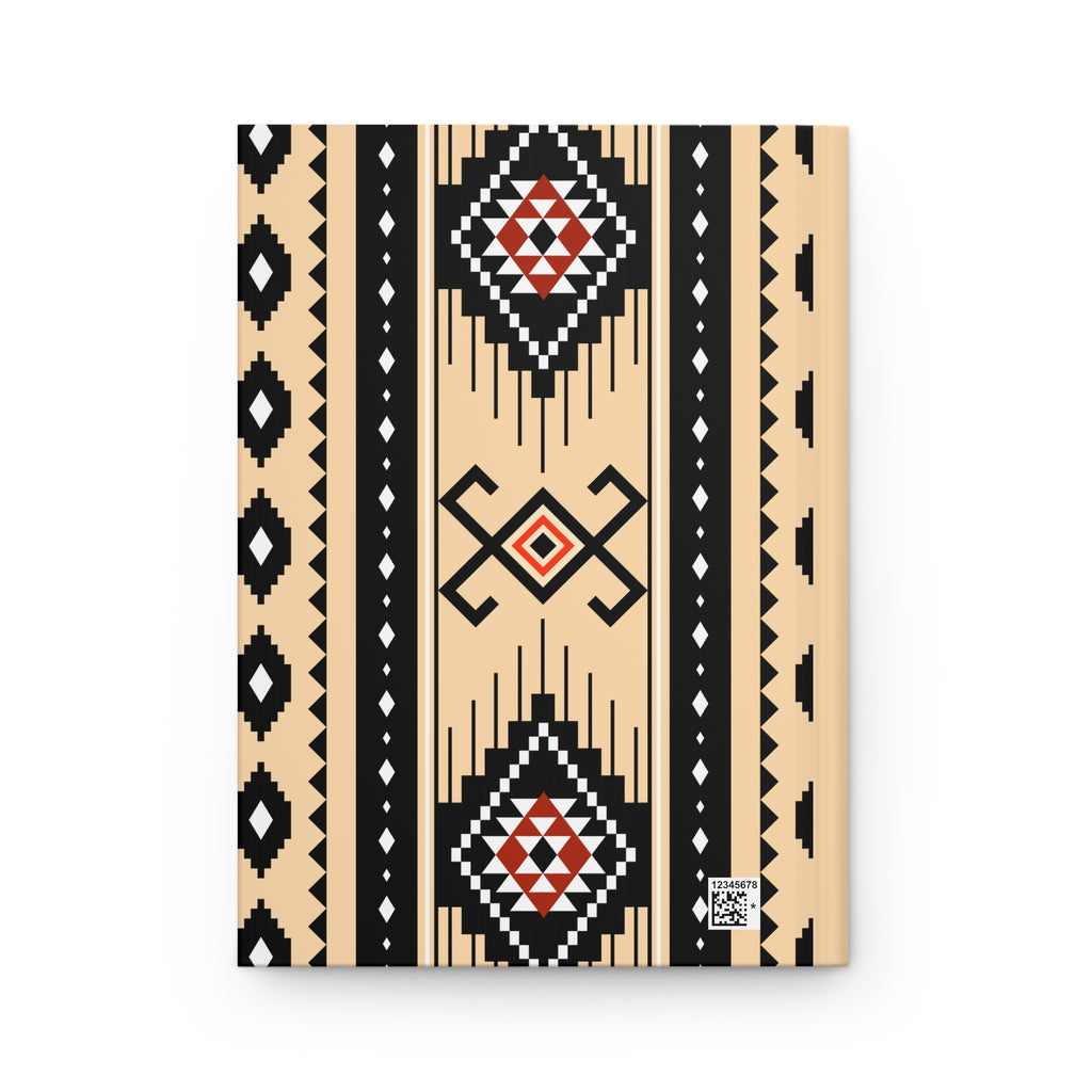 A notebook with a Southwestern geometric pattern on a light wood cover, featuring beige, black, white, and red colors, shown against a plain white background.