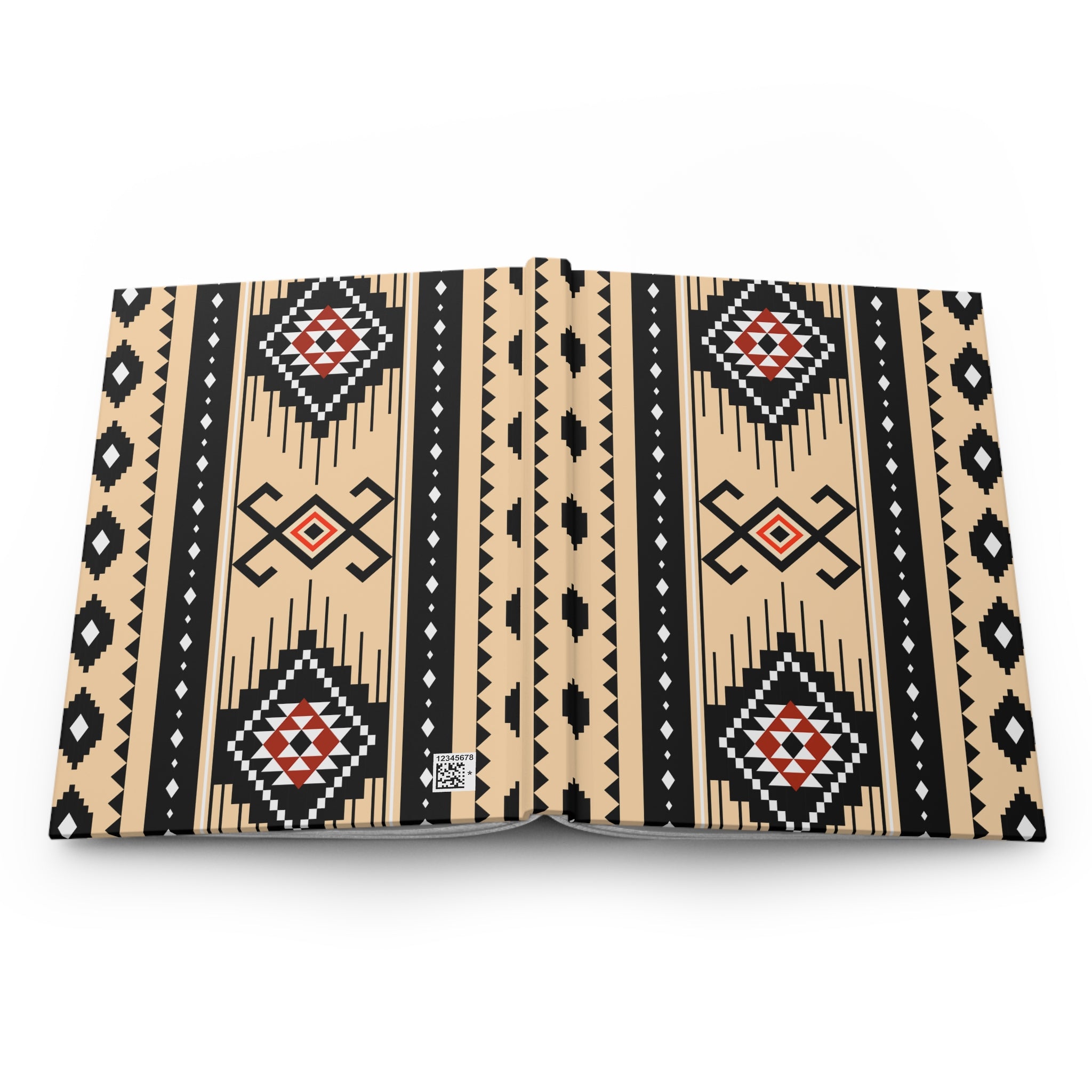 A book or notebook shown open flat against a white background, featuring a bold Southwestern geometric pattern in beige, black, white, and red. A small square logo is visible on the bottom center page.