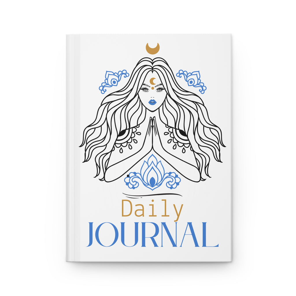 A white hardcover daily journal featuring an illustration of a woman with long flowing hair, blue ornamental details, and gold and blue text reading 'Daily JOURNAL' on the front cover.