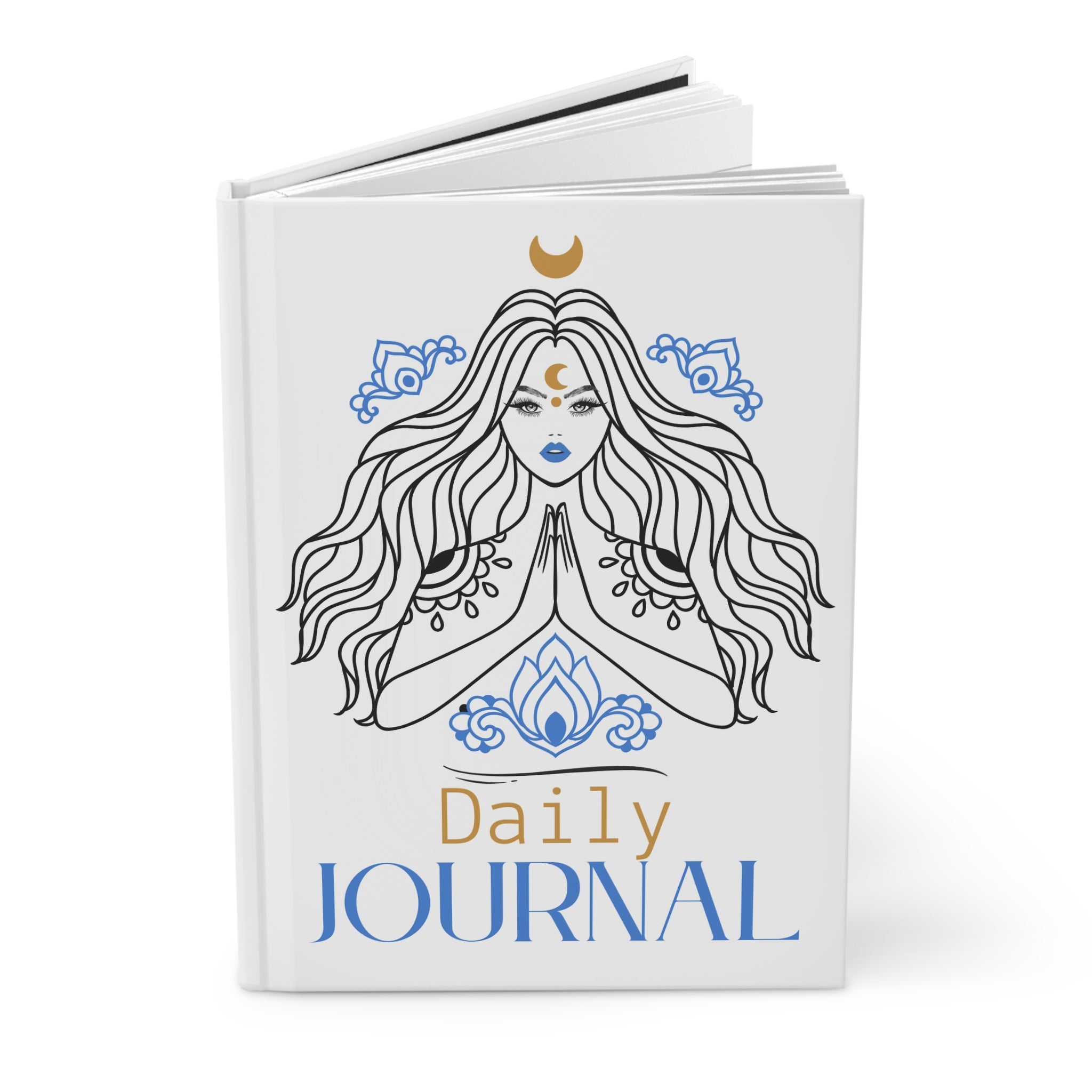 A white hardcover daily journal shown open at a slight angle, featuring a line-art illustration of a woman with long flowing hair, blue decorative motifs, a gold crescent moon, and the text 'Daily JOURNAL' on the cover.