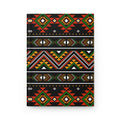 A hardcover notebook with a black cover decorated with multiple horizontal bands of colorful geometric tribal patterns in red, green, orange, yellow, and white, shown on a clean white background.