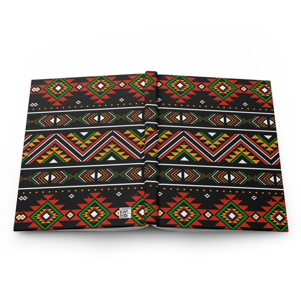 A square fabric item, likely a bandana, scarf, or small bag, featuring a vibrant Southwestern geometric pattern on a black background. The pattern includes red, green, yellow, and white tribal-style diamond and chevron motifs.