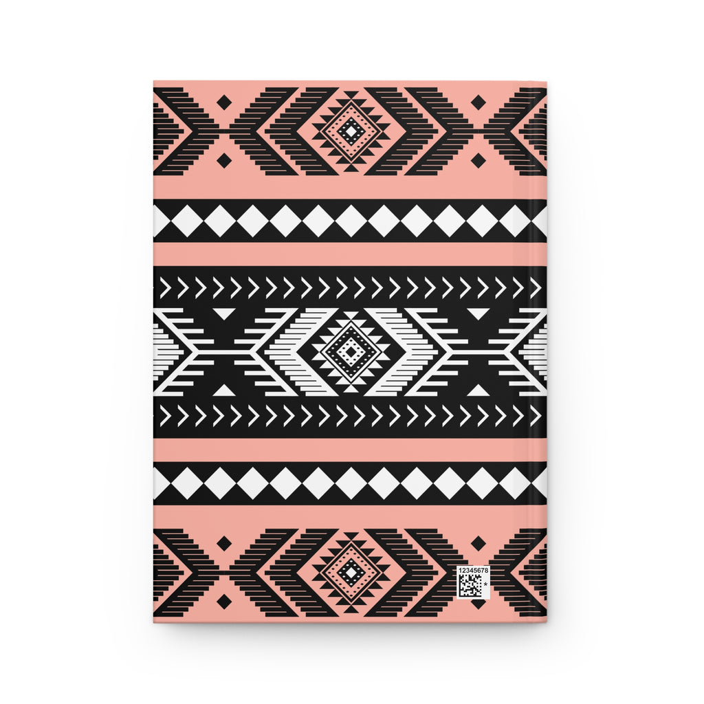 A notebook with a geometric Southwestern pattern in black, white, and soft pink, shown on a clean white background.