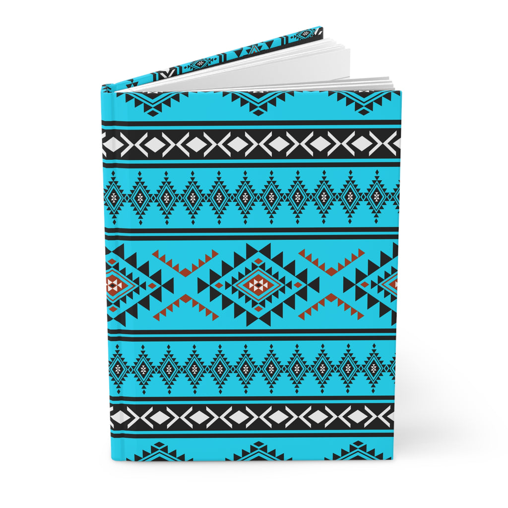 A hardcover notebook with a vibrant turquoise cover featuring a detailed geometric Southwestern-style pattern in black, white, and orange-red, shown on a clean white background.