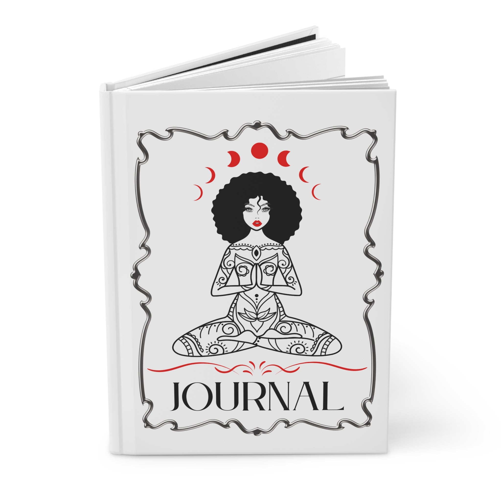 A white hardcover journal shown open against a clean white background. The front cover features a black line-art illustration of a seated woman with an afro, red moon phases above her head, and the word 'JOURNAL' in black at the bottom.