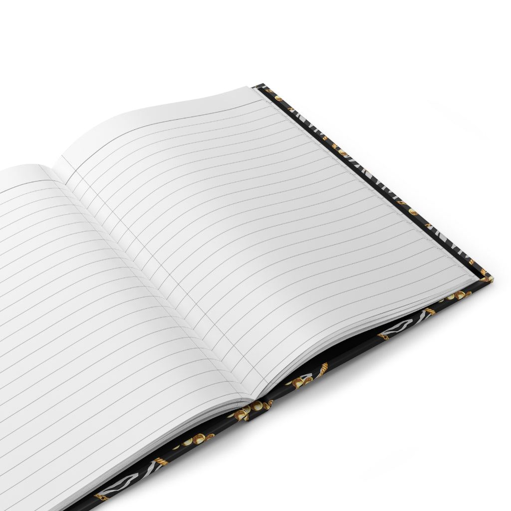 Open notebook with floral edge on a white background