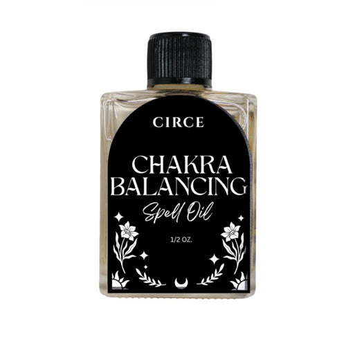 Bottle of Circe Chakra Balancing Spell Oil on a white background