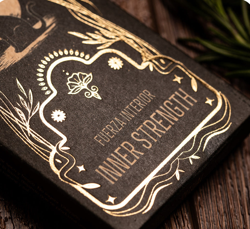 Decorative card with 'Inner Strength' text on a wooden surface
